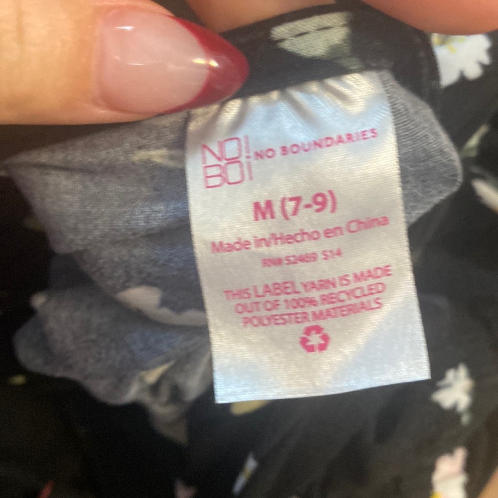 Women’s black dress with light pink and yellow flowers